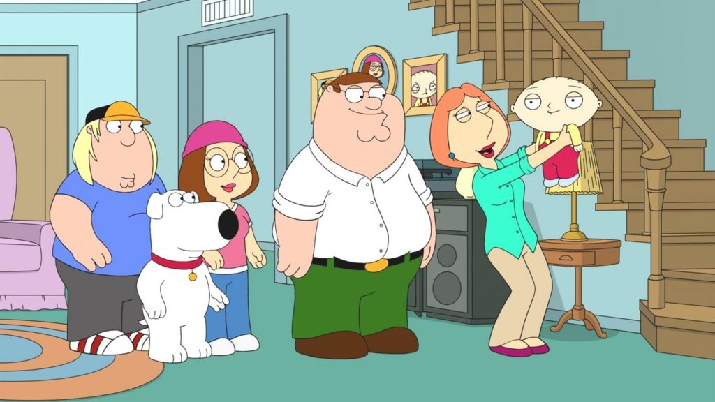 Passion of Arts Familie Griffin ist im Wohnzimmer und Lois hält Stewie hoch. Alle schauen auf ihn