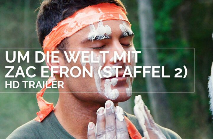 Passion of Arts: Zac Efron hat die Augen geschlossen und weiße Paste im Gesicht, die ihm ein Mann hingeschmiert hat. Dies ist eine Art Ritual