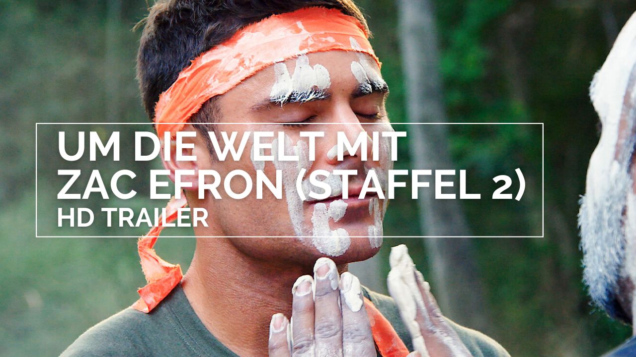 Passion of Arts: Zac Efron hat die Augen geschlossen und weiße Paste im Gesicht, die ihm ein Mann hingeschmiert hat. Dies ist eine Art Ritual