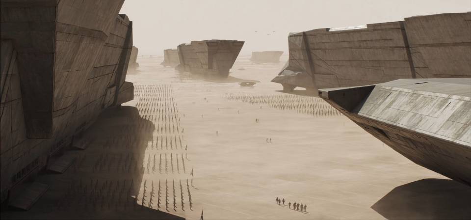 Das Bild zeigt eine Wüstenlandschaft mit riesigen Felsartigen Bauten. Davor hat sich eine Art Armee versammelt | Die 5 einflussreichsten Science-Fiction-Filme aller Zeiten