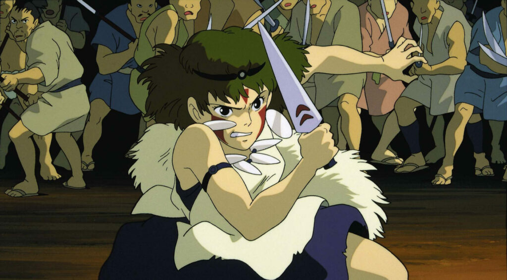 Auf dem Bild ist eine junge Kriegerin, die ein Messer zum Angriff hält und die Zähne fletscht. Hinter ihr ist eine Gruppe von Menschen mit Waffen in den Händen | Prinzessin Mononoke