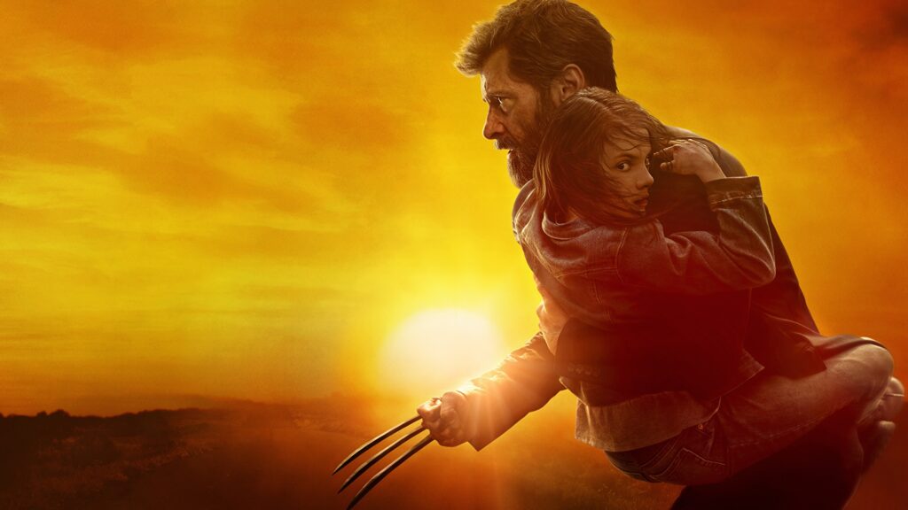 Logan (Hugh Jackman) mit einem Mädchen, im Hintergrund eine Sonnenuntergang. | Top 5 Marvel-Filme