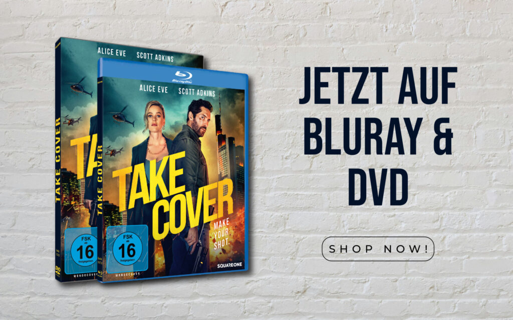 Das Cover der Blu-ray und DVD-Veröffentlichung des Films „Take Cover“. Zwei Charaktere stehen vor einer Stadtsilhouette, über der Hubschrauber fliegen. Der Titel „Take Cover“ ist deutlich sichtbar, zusammen mit dem Untertitel „Make Your Shot“. Die Namen der Schauspieler:innen Alice Eve und Scott Adkins sind ebenfalls auf dem Cover aufgeführt. In deutscher Sprache steht „JETZT AUF BLURAY & DVD“ geschrieben, was übersetzt „Jetzt auf Blu-ray & DVD“ bedeutet. Ein Button mit der Aufschrift „SHOP NOW!“ ist ebenfalls Teil des Designs.