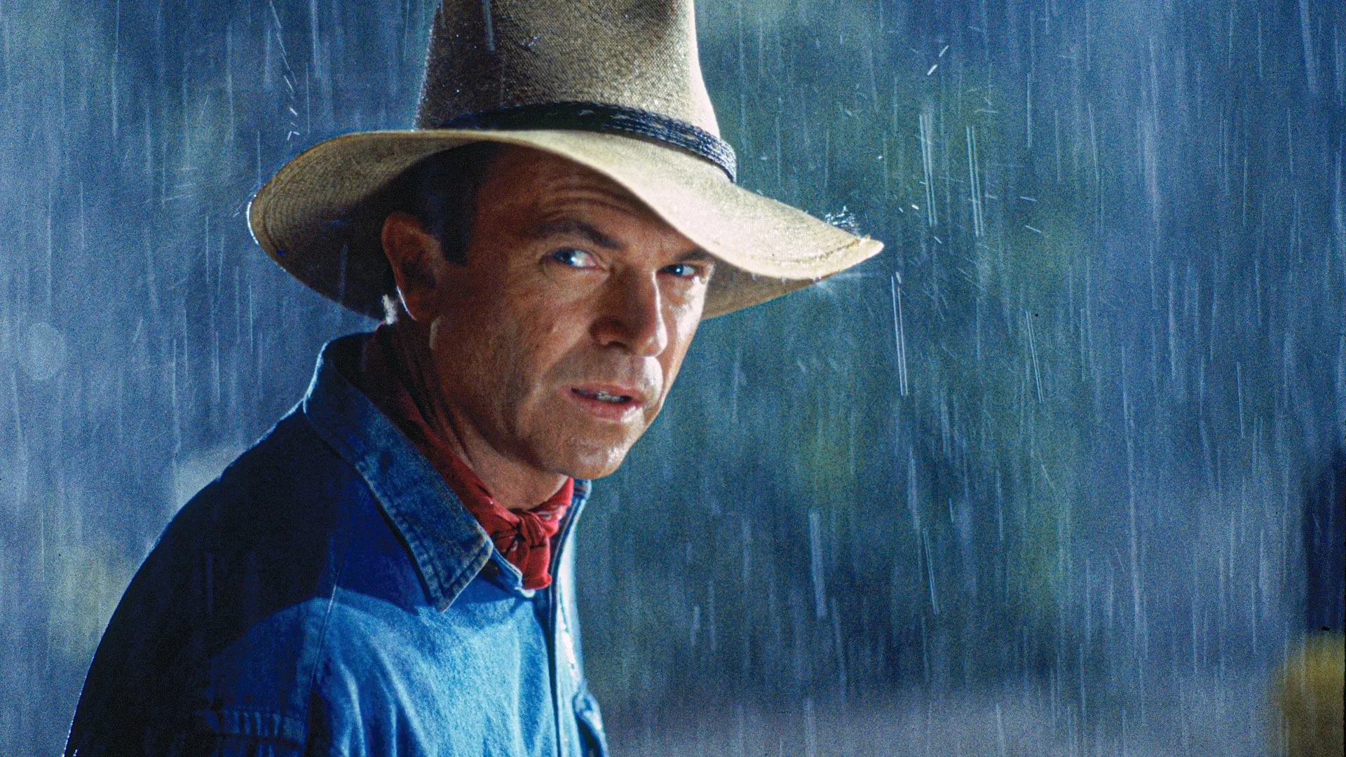 Das Bild zeigt Dr. Alan Grant (Sam Neill) in "Jurassic Park" | Die 5 besten Filme die ich meinen Kindern zeigen möchte
