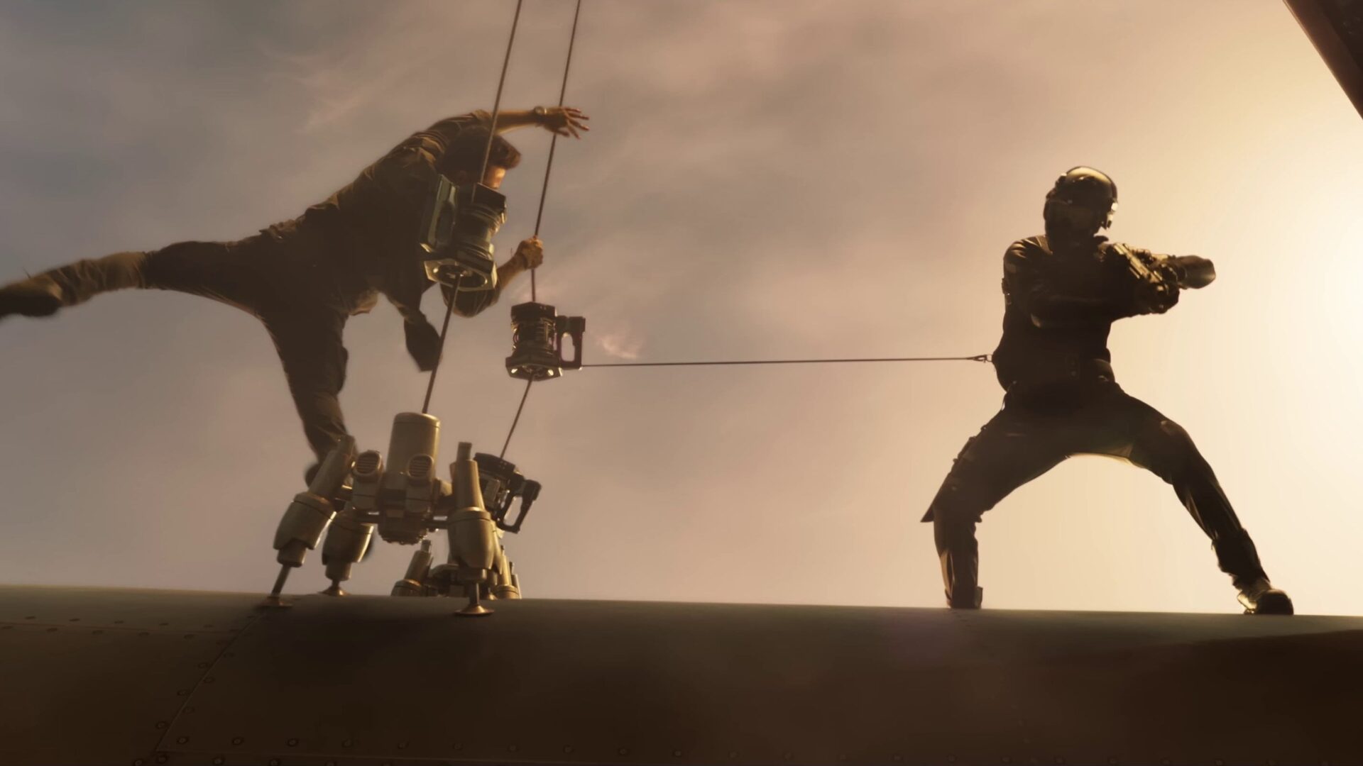 Zwei Personen kämpfen mit Seilen an ein Flugzeug befestigt gegeneinander. | War 2 – Filmkritik