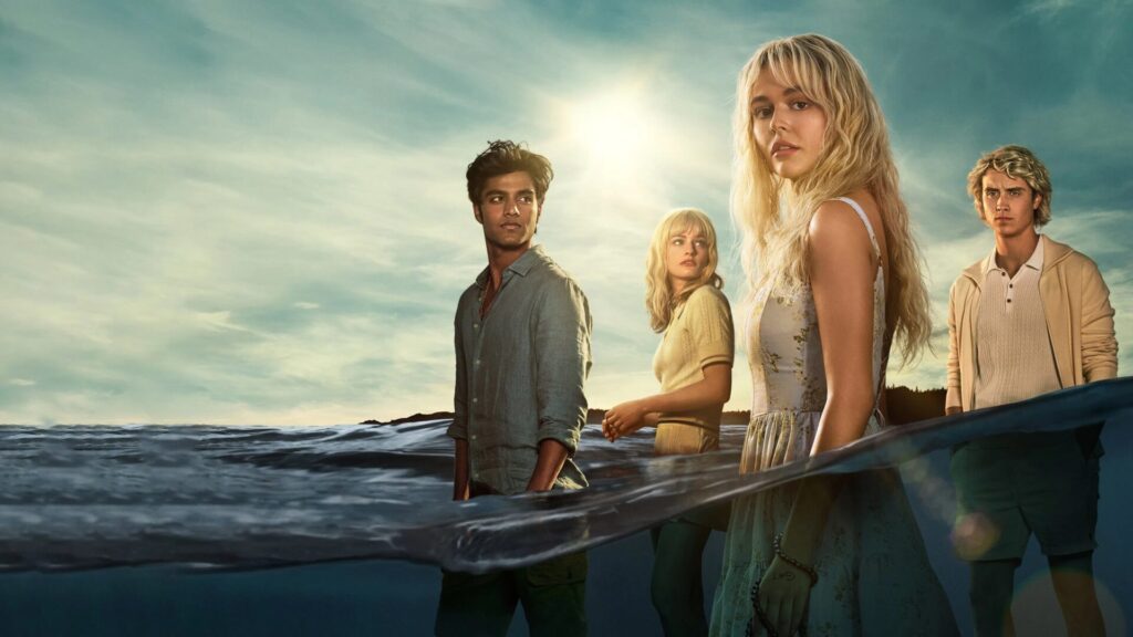 Das Bild zeigt den Cast der Serie "Solange wir lügen" im Wasser stehend