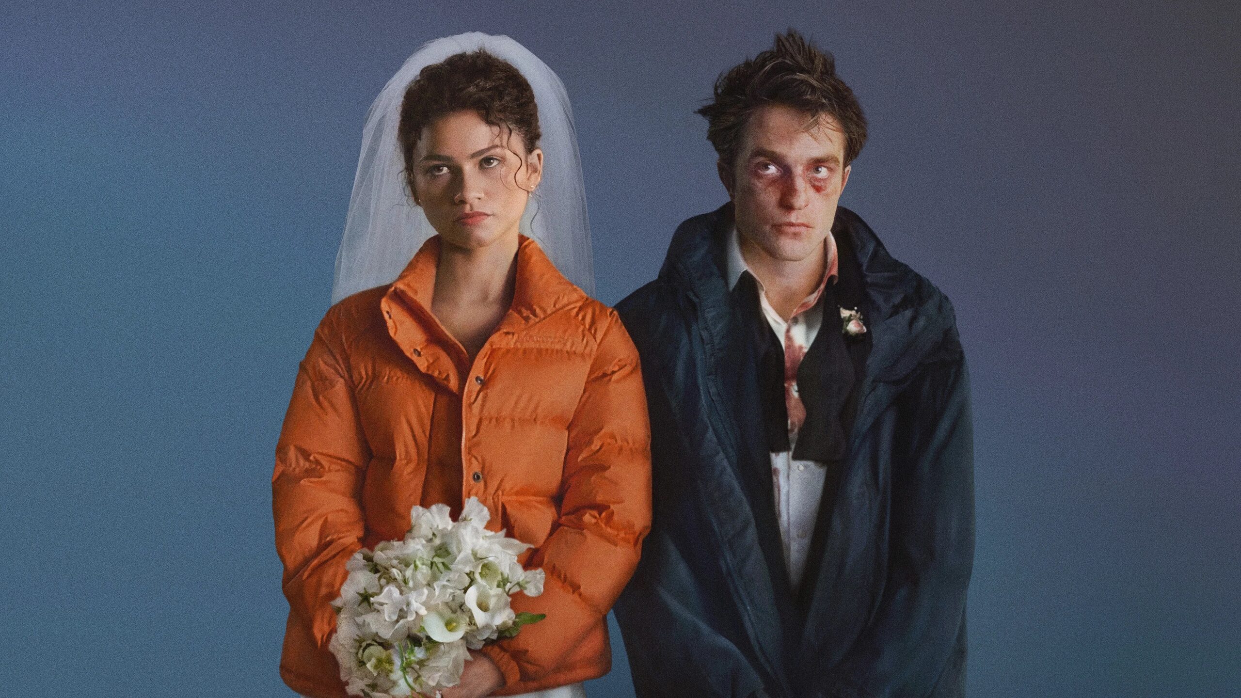Zendaya und Robert Pattinson in einer Szene aus Das Drama: Sie im Brautlook mit Schleier und Blumenstrauß, er verletzt und blutverschmiert im Hochzeitsanzug – kontrastreiche Darstellung einer eskalierenden Beziehungssituation.