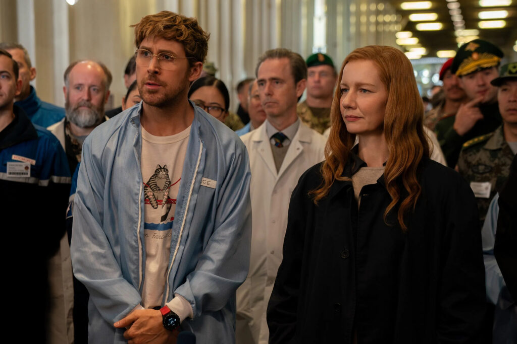 Das Bild zeigt Ryan Gosling (links) und Sanra Hüller in Der Astronaut