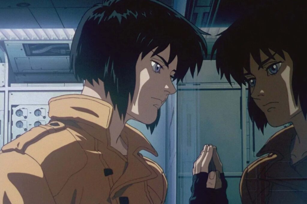 Major Motoko Kusanagi in Ghost in the Shell (1995) vor einem Spiegel; ikonische Cyberpunk‑Szene über Identität und Selbstwahrnehmung. | Media Monday #777