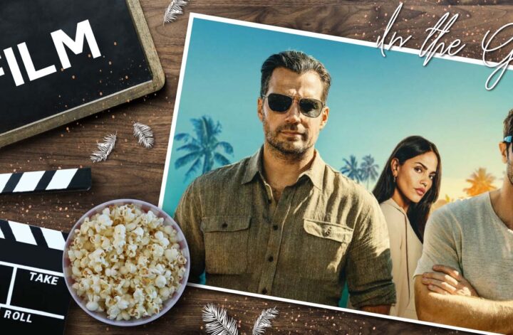 Filmstill zu In the Grey: Henry Cavill, Eiza González und Jake Gyllenhaal stehen gemeinsam vor Palmen im Sonnenlicht, alle mit Sonnenbrillen, während links im Bild eine Filmklappe, Popcorn und das Wort „Film“ auf einer Tafel liegen. Die Komposition verbindet Kino‑Ästhetik mit einem Promo‑Look der drei Hauptdarsteller.
