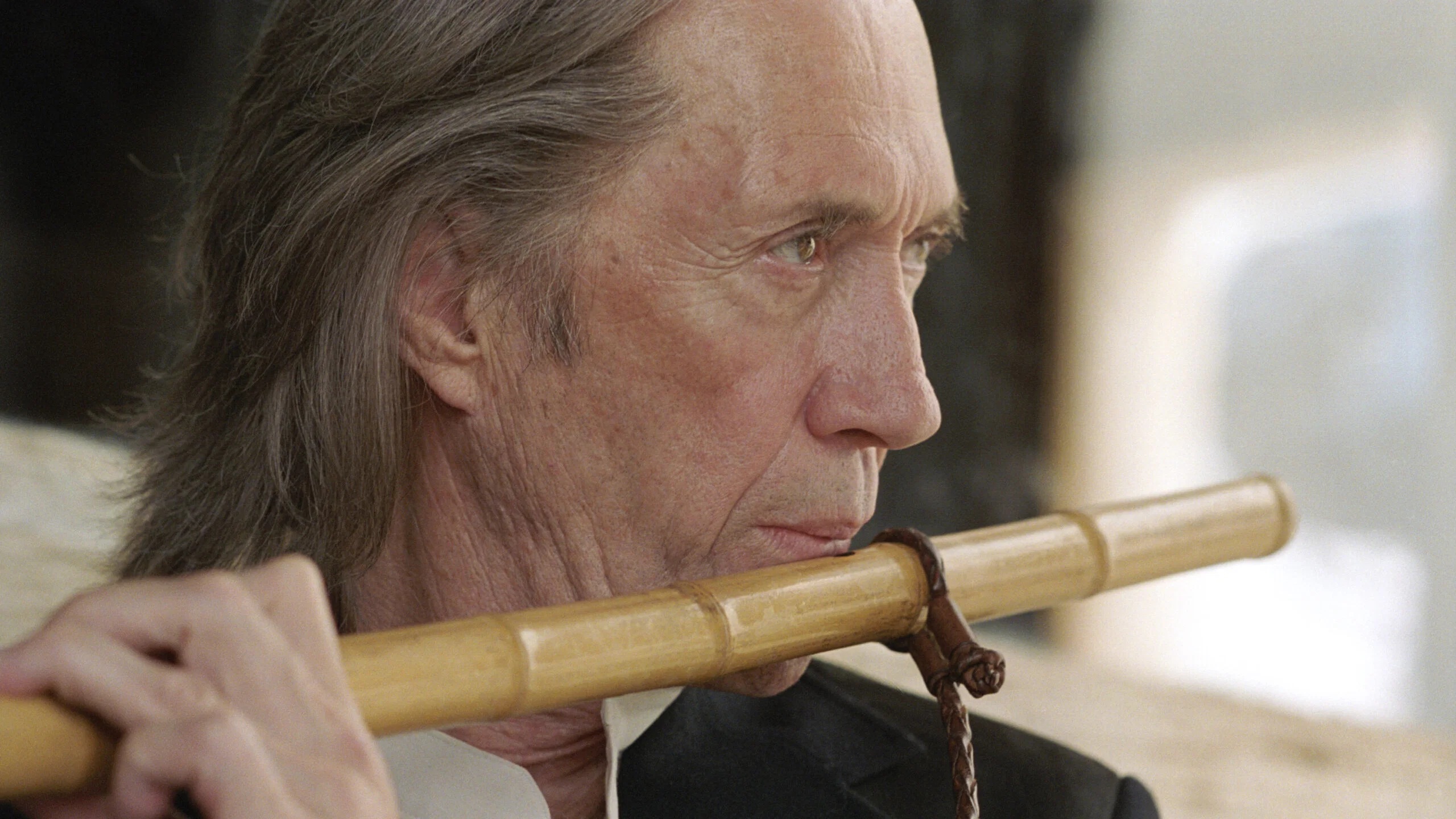 Bill (David Carradine) spielt auf einer Flöte