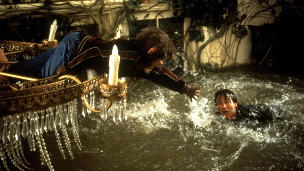 Alan Parrish kämpft im überfluteten Haus gegen die Wassermassen in „Jumanji“. | Die 5 besten Filme mit Horror-Potential