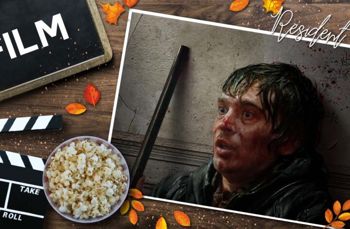 Gestaltete Grafik zur Filmkritik von Resident Evil, aus dem Jahr 2026, auf einem rustikalen Holzhintergrund mit verstreuten Herbstblättern. Links befinden sich eine Filmklappe, eine Tafel mit der Aufschrift „FILM“ und eine Schüssel Popcorn. Rechts ist ein eingearbeitetes Filmposter zu sehen, das Austin Abrams mit blutverschmierten Gesicht und aufgerissenen Augen zeigt. Er lehnt an einer Wand, die ebenso mit Blut bespritzt ist und Risse hat. Neben ihm sieht man das Rohr einer Schrotflinte aufragen. Oben rechts steht der Filmtitel Resident Evil in geschwungener Schrift. Die Grafik kombiniert Kinoelemente mit herbstlicher Dekoration.