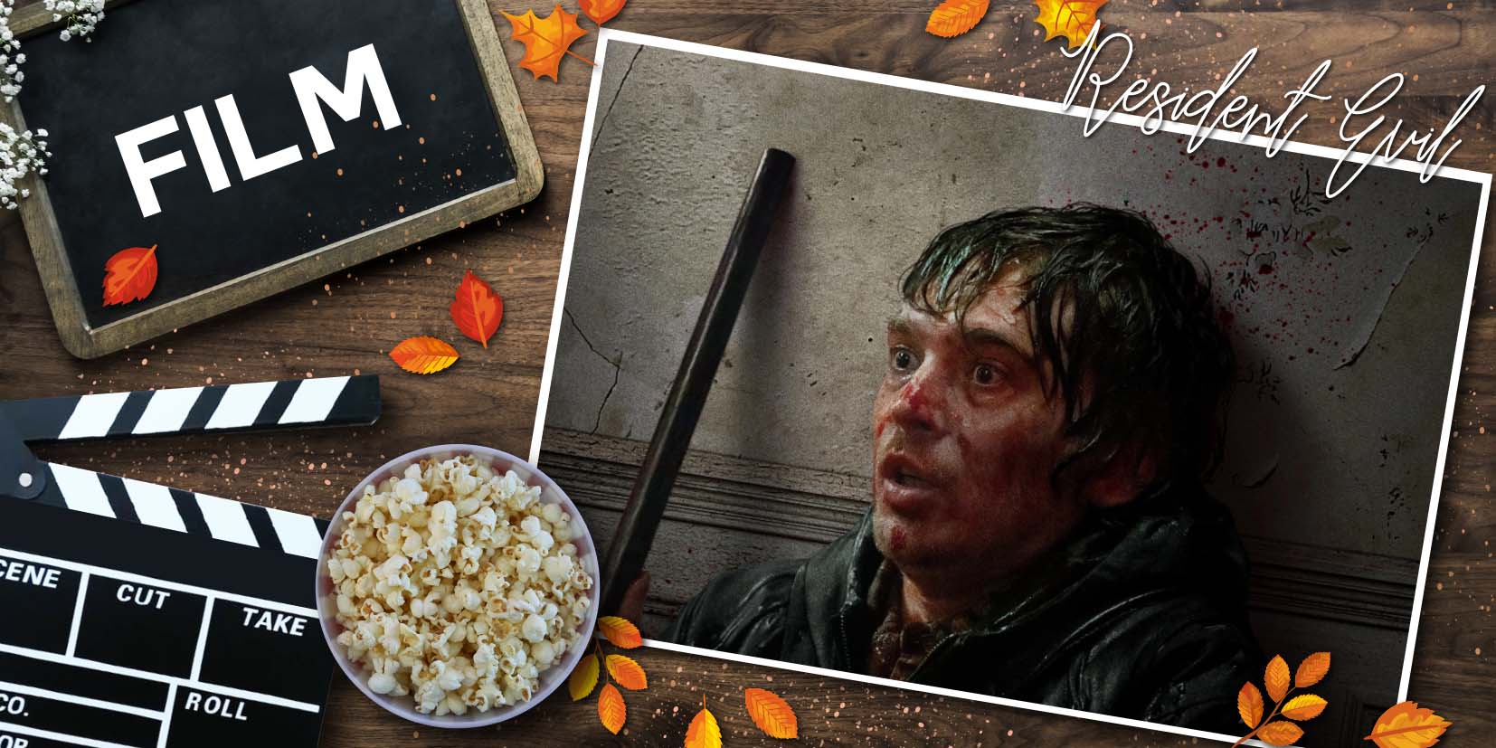 Gestaltete Grafik zur Filmkritik von Resident Evil, aus dem Jahr 2026, auf einem rustikalen Holzhintergrund mit verstreuten Herbstblättern. Links befinden sich eine Filmklappe, eine Tafel mit der Aufschrift „FILM“ und eine Schüssel Popcorn. Rechts ist ein eingearbeitetes Filmposter zu sehen, das Austin Abrams mit blutverschmierten Gesicht und aufgerissenen Augen zeigt. Er lehnt an einer Wand, die ebenso mit Blut bespritzt ist und Risse hat. Neben ihm sieht man das Rohr einer Schrotflinte aufragen. Oben rechts steht der Filmtitel Resident Evil in geschwungener Schrift. Die Grafik kombiniert Kinoelemente mit herbstlicher Dekoration.